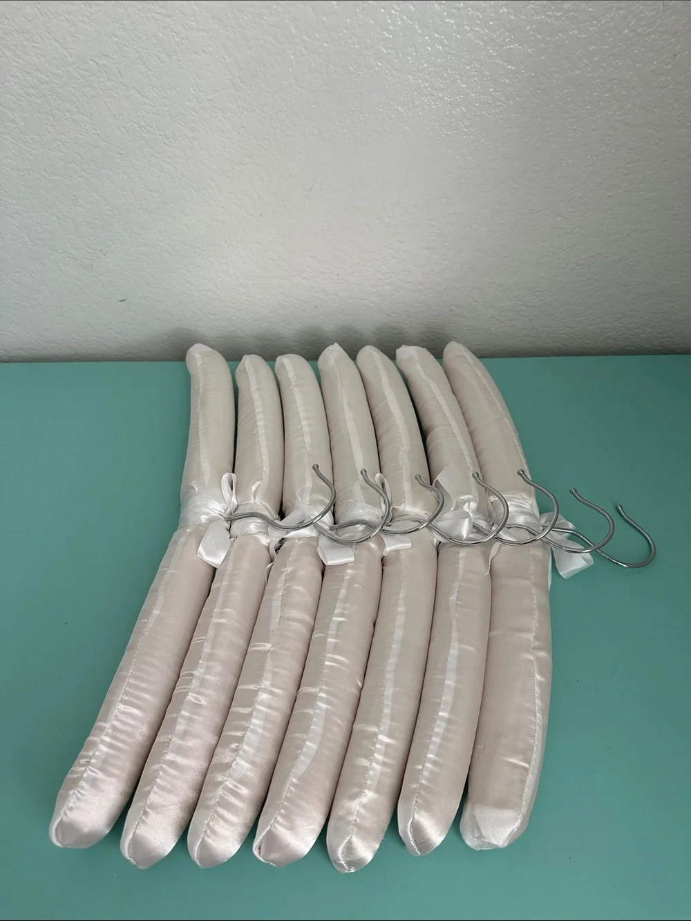 Satin white glossy padded heavy duty hangers-set of 7ct. with a bow-brand new